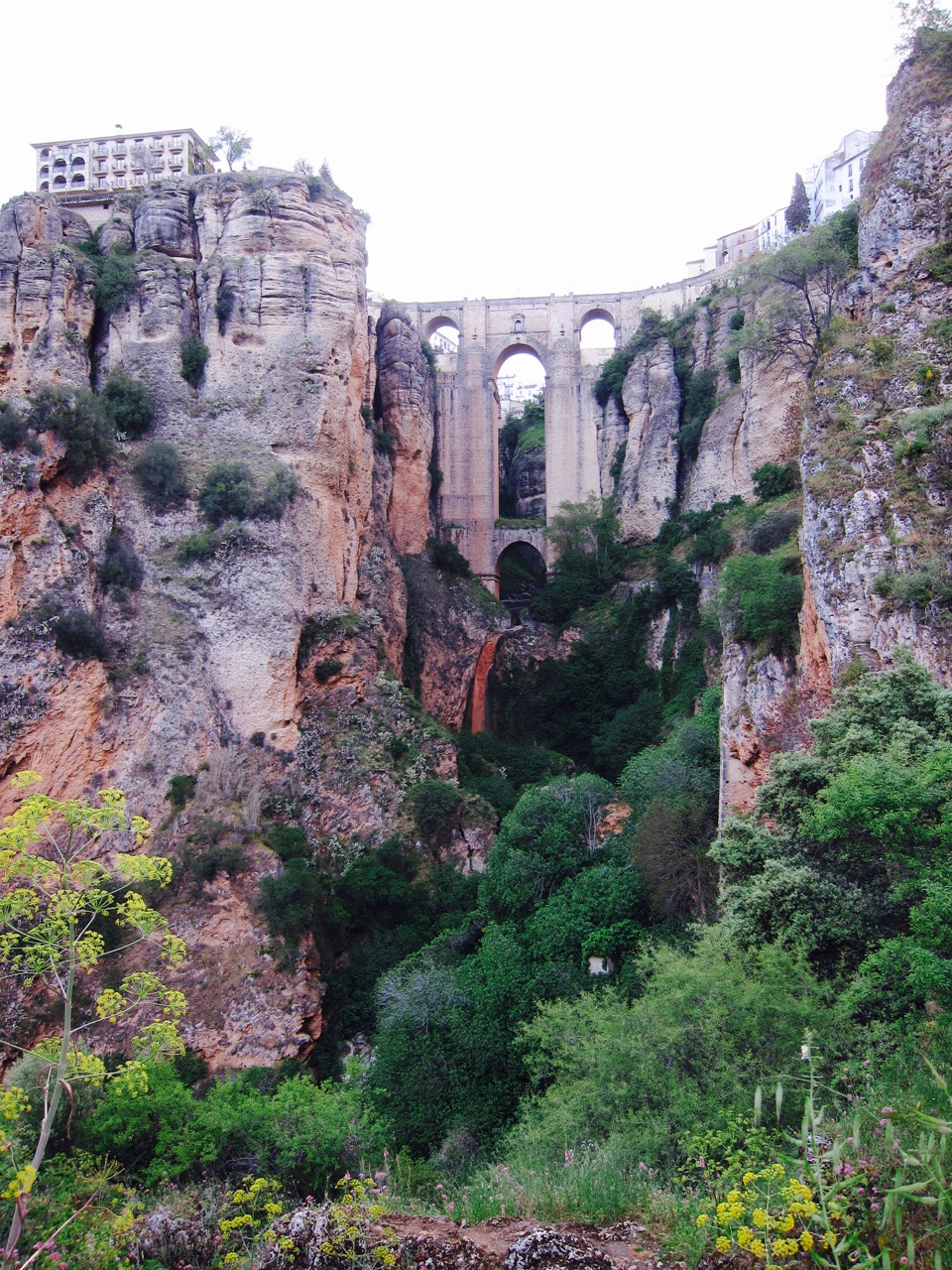 Ronda's Puente Nuevo with muddy water